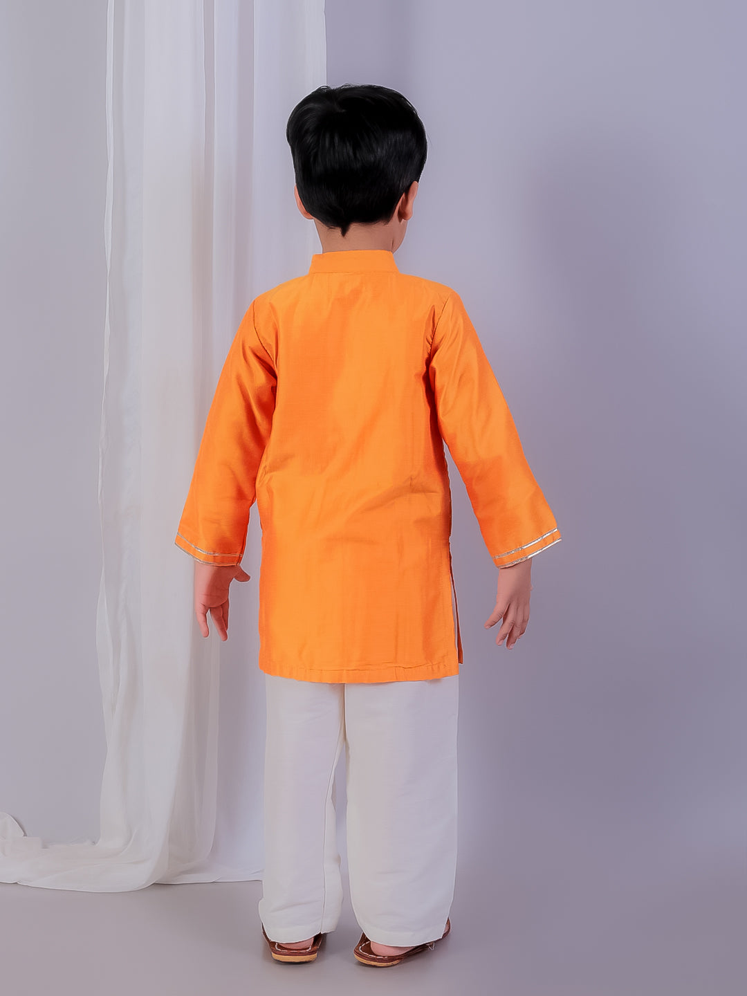 Orange kurta with zari attached Jacket and Pyjama