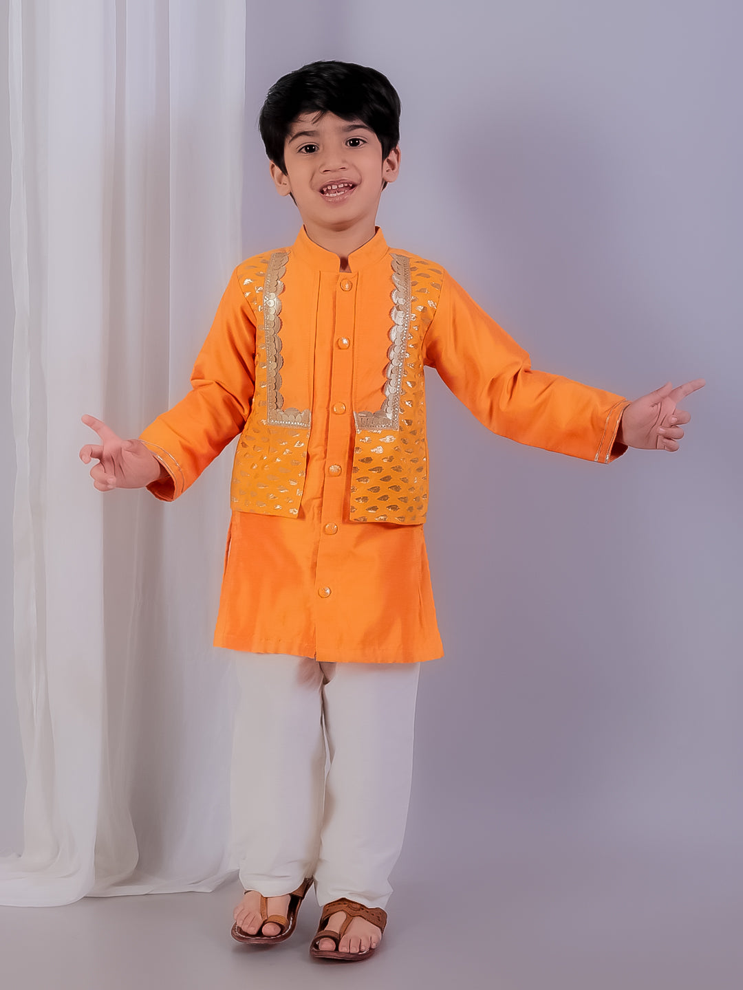 Orange kurta with zari attached Jacket and Pyjama