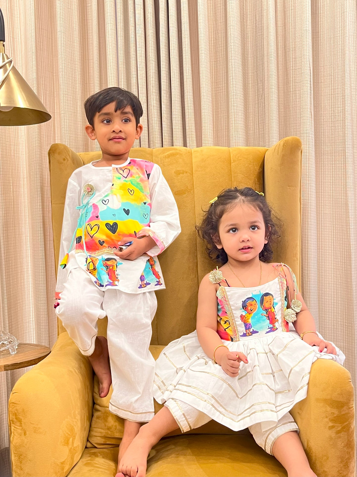 Yellow printed kurta pyjama set with attached print panel