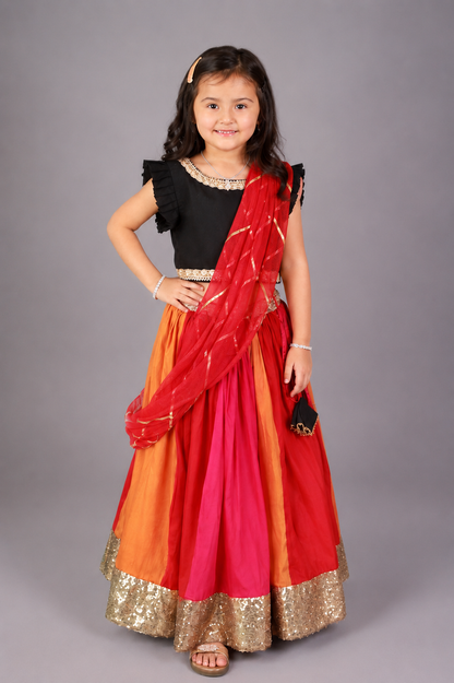 Black Ruffled blouse with multi color lehnga