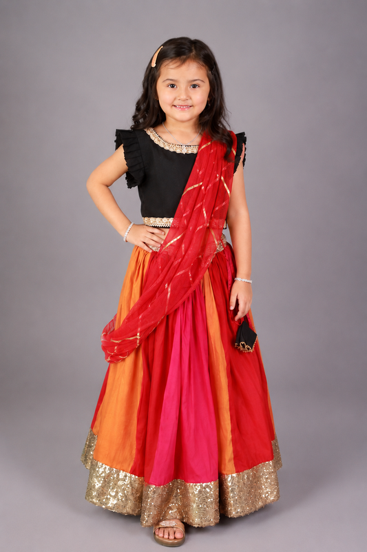 Black Ruffled blouse with multi color lehnga