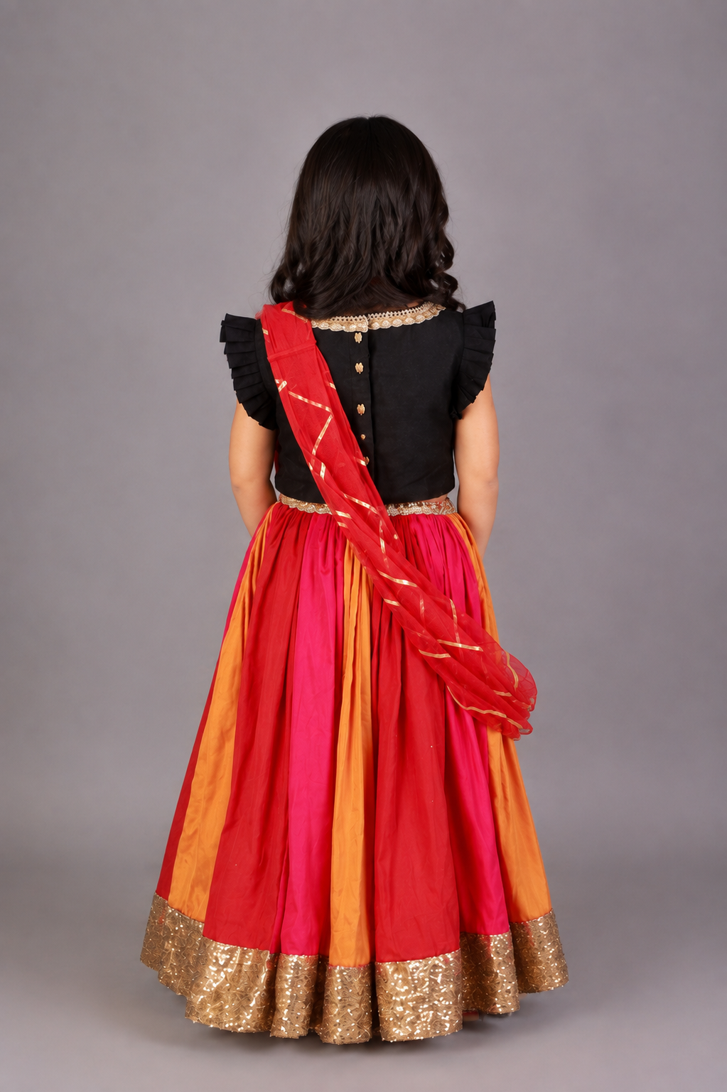 Black Ruffled blouse with multi color lehnga