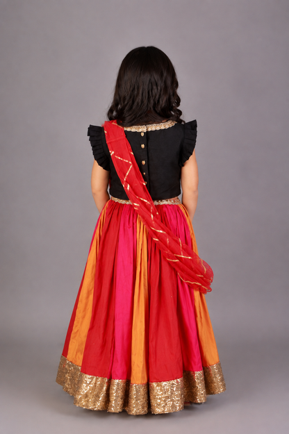 Black Ruffled blouse with multi color lehnga