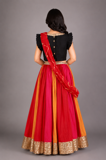 Black Ruffled blouse with multi color lehnga