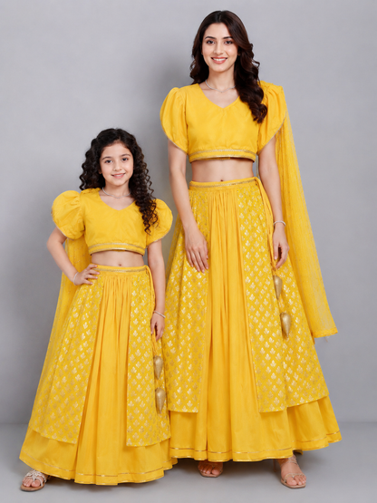 Mustard Blouse with attached net Dupatta and double layered lehnga