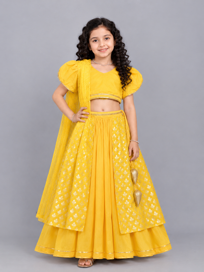Mustard Blouse with attached net Dupatta and double layered lehnga