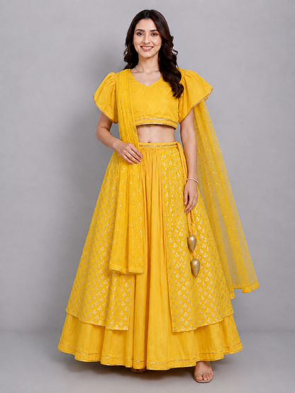 Mustard Blouse with attached net Dupatta and double layered lehnga