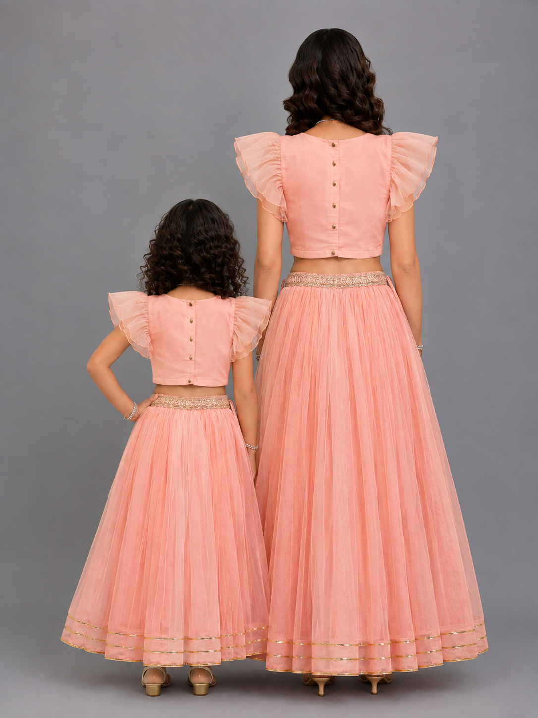 Peach Frilly Top with Double layered net Lehnga