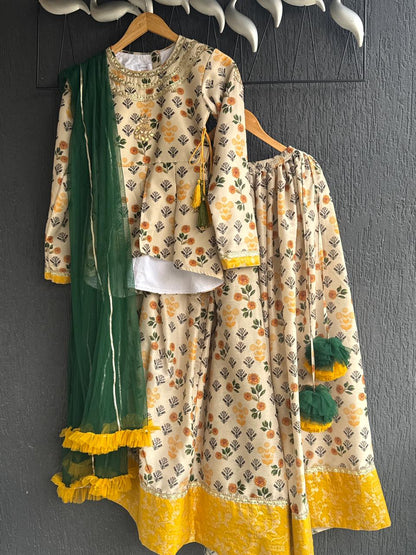 Marigold Printed peplum top With Lehenga And Net Dupatta