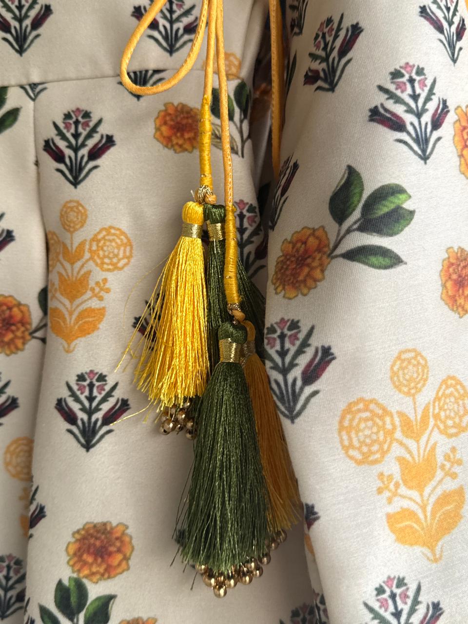 Marigold Printed peplum top With Lehenga And Net Dupatta