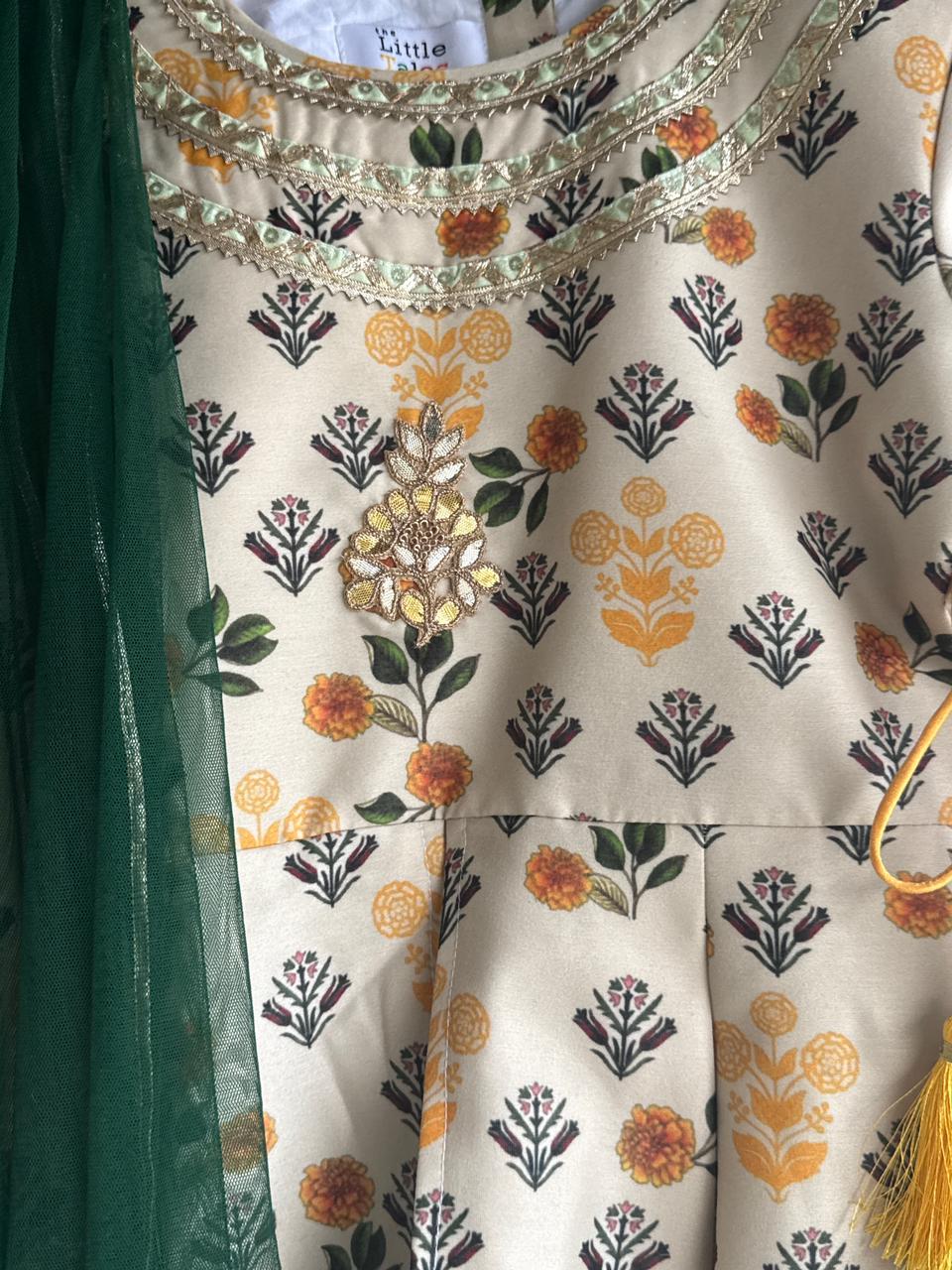 Marigold Printed peplum top With Lehenga And Net Dupatta