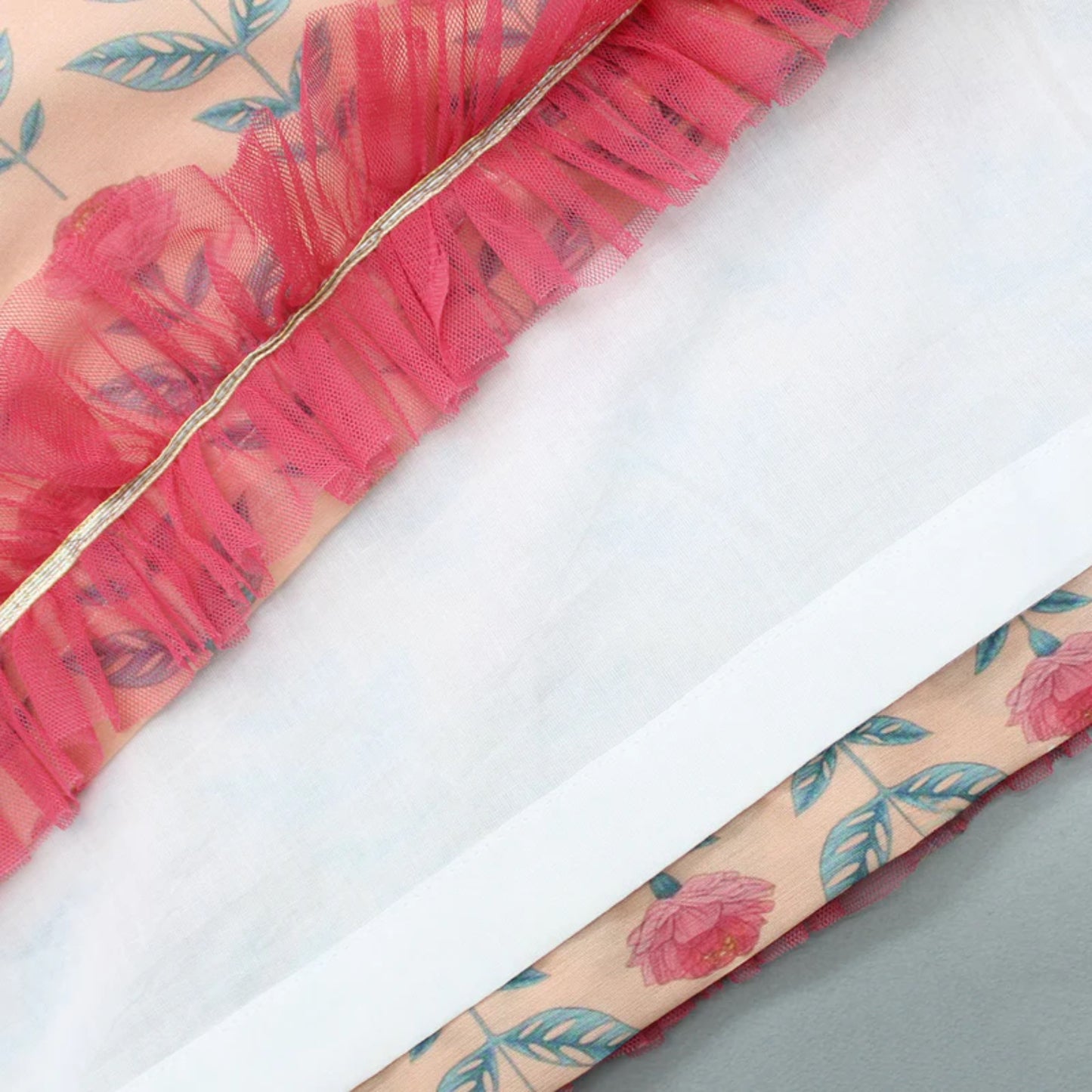 Peach printed Floral Printed Crop Top With Lehenga And Net Dupatta